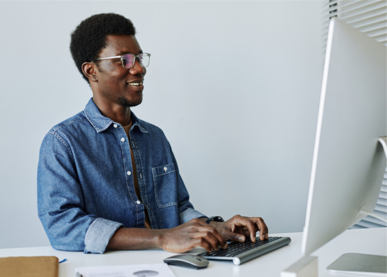 man in front of computer